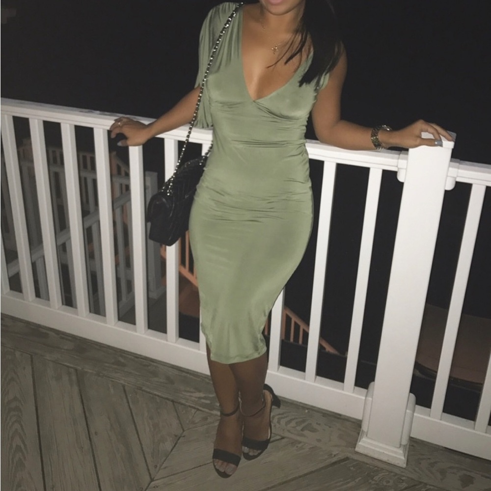 Green asymmetric one shoulder low cut midi dress